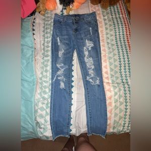 Juniors size 7 ripped jeans, stretchy
